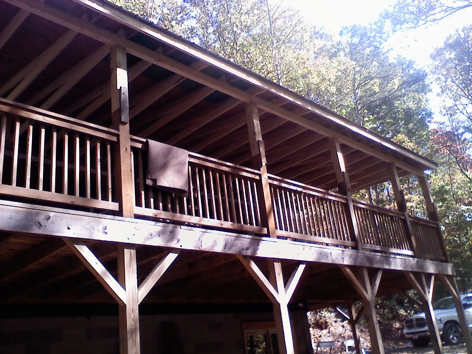 Timber framing under a new elevated porch and deck — Roof Leak Repair in Kankakee by Roofing Brothers